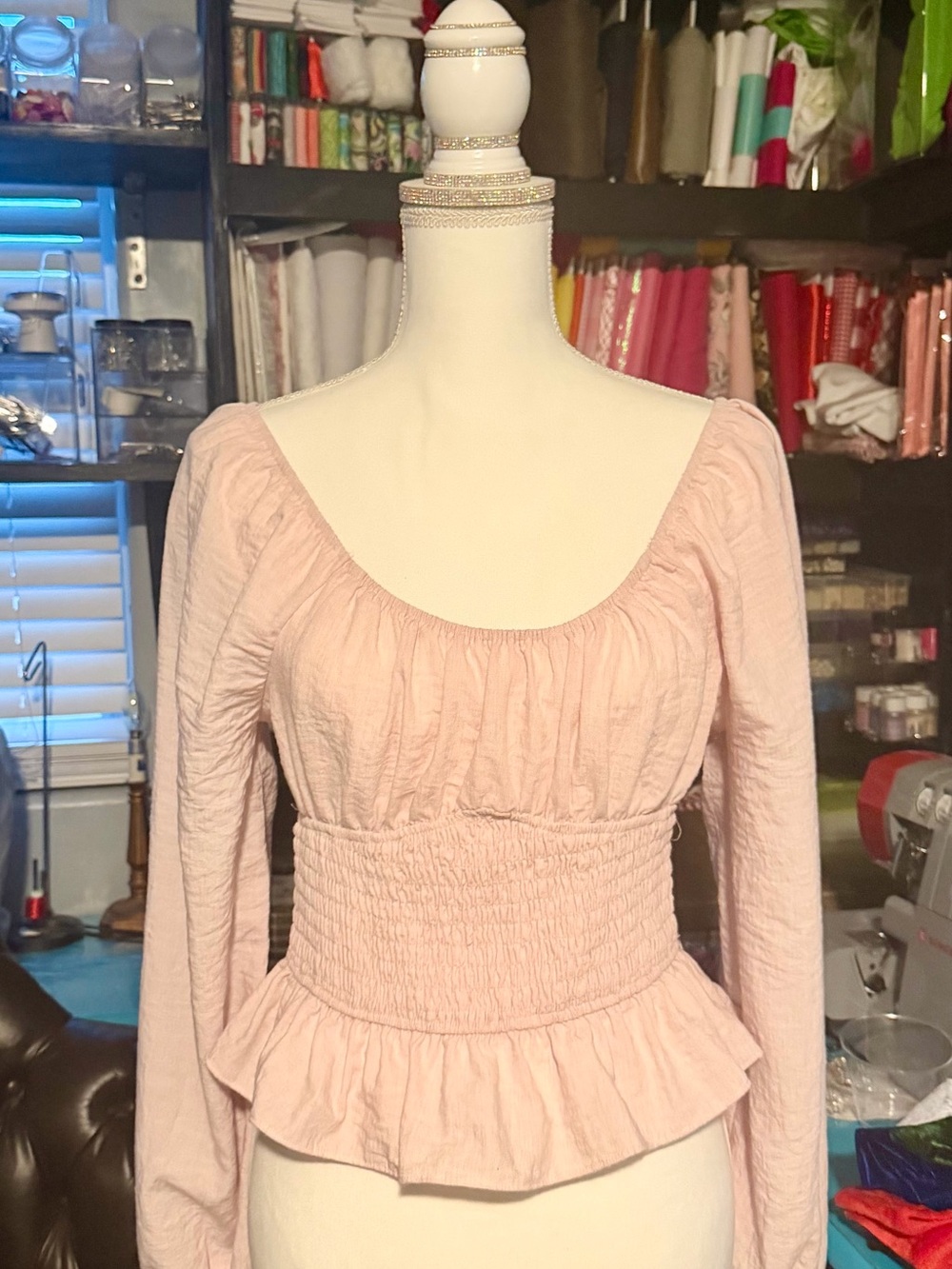 Smocked Peplum Long-Sleeve Tunic in Light Pink